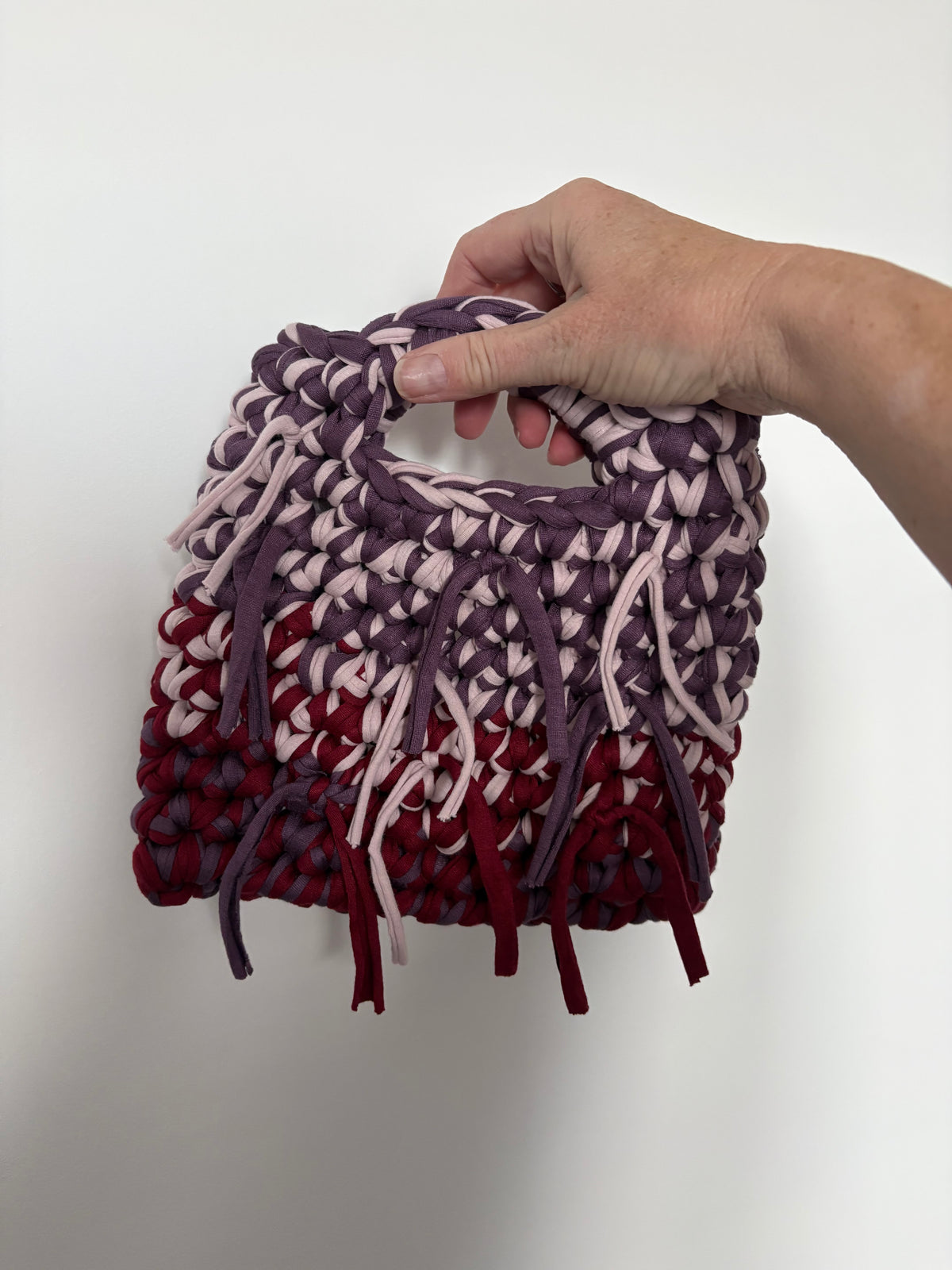 Small fringe bag made with t shirt yarn